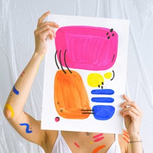 Photo Of Woman Holding Paint Work