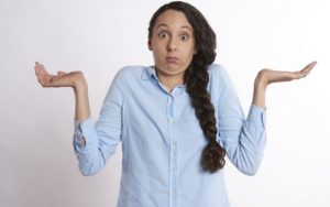 Woman shrugging
