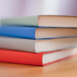 stack of colored books