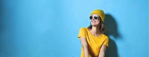 woman wearing yellow smiling
