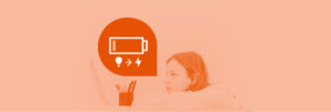 An orange-tinted image of a girl working on a laptop. A speech bubble with a battery icon and symbols for light and energy appears beside her, representing creativity and power.