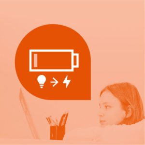 An orange-tinted image of a girl working on a laptop. A speech bubble with a battery icon and symbols for light and energy appears beside her, representing creativity and power.