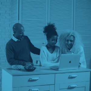 A family looking at a computer