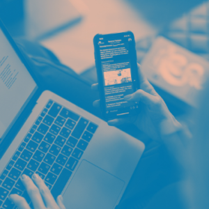 hand scrolling through social media on a smartphone