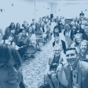 school communication professionals smiling for a group picture