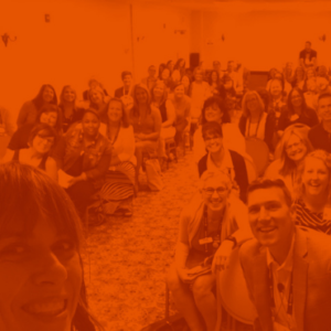 school communications professionals smiling for a group photo
