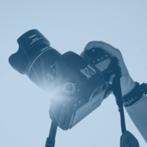 A camera being held up in the air