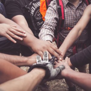 People Doing Group Hand Cheer