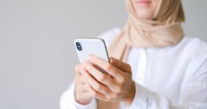 woman holding phone