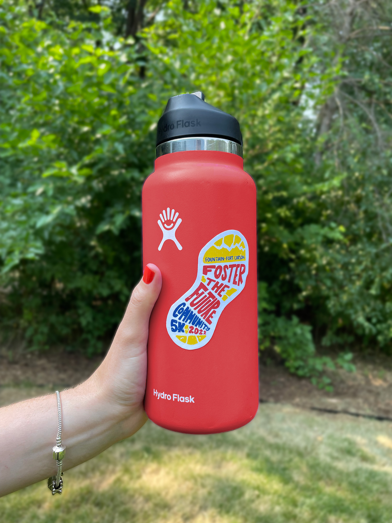 community 5k foster the future sticker on water bottle