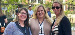 jodi and amy from madison metropolitan school district with chelsea janke at Finalsite University 2023