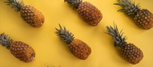 Pineapples on a yellow background