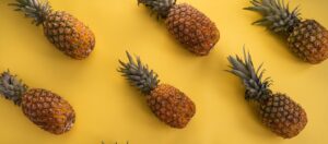 Pineapples on a yellow background