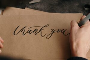 hand script writing Thank you