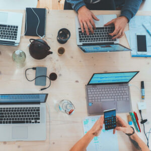 High-angle shot of unrecognisable business people having a meeting in an office