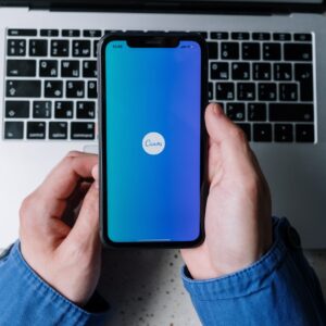 Holding a Smartphone in front of an Imac