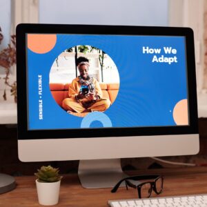 Picture of a desktop monitor with a designed presentation on the screen