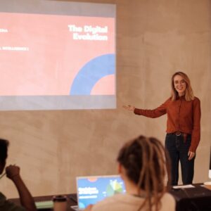 Woman giving a presentation on the value of digital marketing and website changes