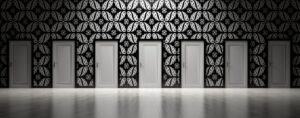 A hallway full of white doors, closed. Implying options to choose from.