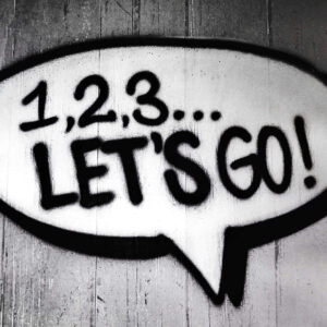 1, 2, 3...Let's Go spraypainted in a word bubble on wood