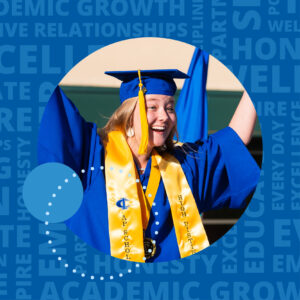 graduate from C-I Schools cheering at graduation in cap and gown