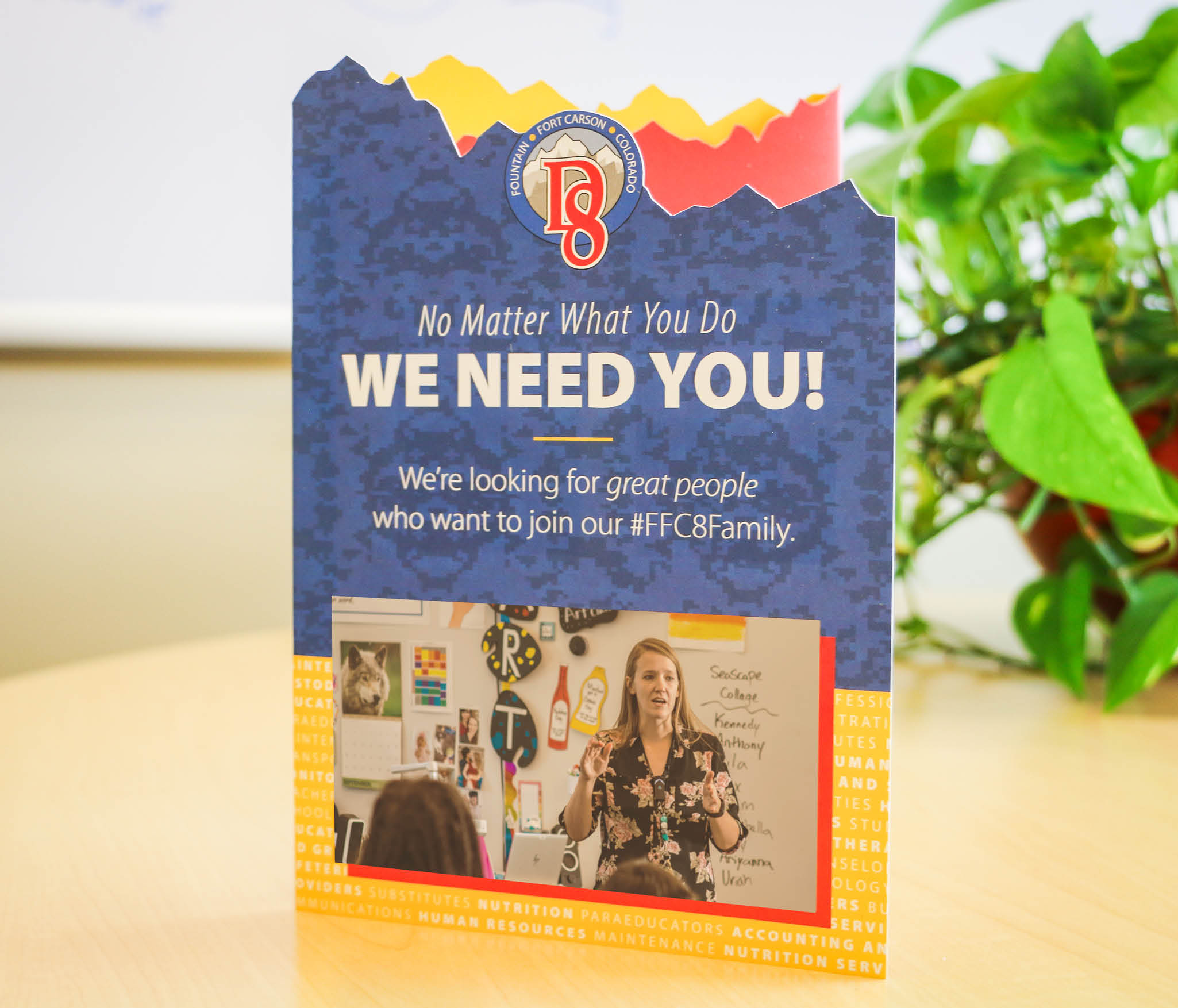 An employee recruitment brochure for Fountain-Fort Carson School District 8 reading "No Matter What You Do, WE NEED YOU!"