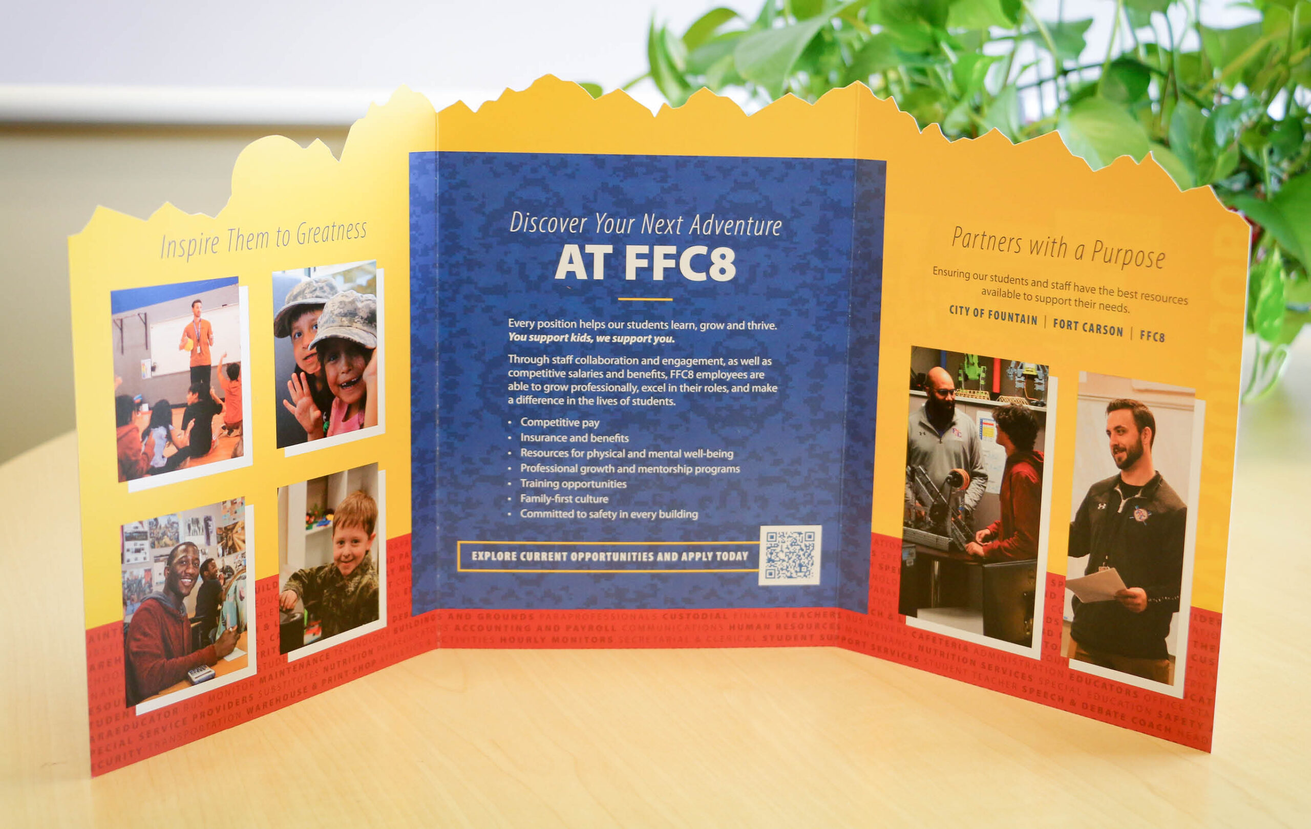 An employee recruitment brochure for Fountain-Fort Carson School District 8. The brochure is colorful, has great photos of staff, and the top is die-cut like the mountains ringing FFC8.