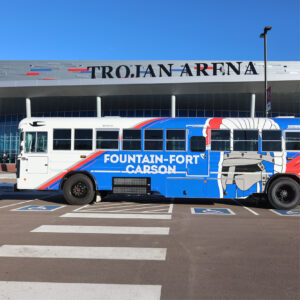 Custom FFC8 wrapped bus outside arena