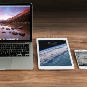 Photo of a laptop, tablet and phone