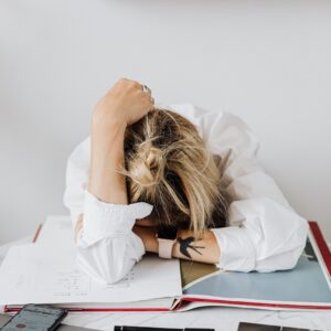Woman stressed at work over many surprise changes